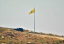 Hizbullah flag near Metulla