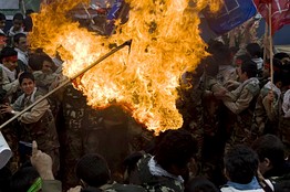 11-4-09 Iranian demonstrators burn US flag Iranian demonstrators burned an U.S. flag outside the former U.S. Embassy in Tehran. Raheb Homavandi/Reuters