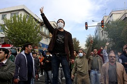 11-4-09 antigov protestor in Iran Antigovernment protestors chanted slogans on the sidelines of state-sanctioned rallies. Associated Press