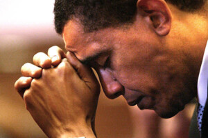 4-18-11 Obama praying closeup