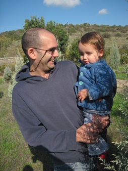Shai Freund with his son. Photo: Yoav Devir