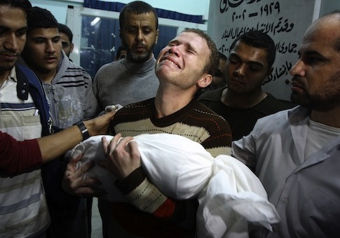 Jihad Masharawi holds dead infant son