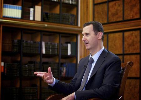 Syria's President Bashar al-Assad speaks during an interview with Russian state television RU24 in Damascus in this September 12, 2013 handout photo by Syria's national news agency SANA. Credit: Reuters/SANA/Handout via Reuters
