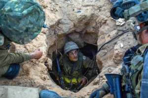 Israeli soldiers discover the entrance to a tunnel believed to belong to Hamas in southern Israel near the border with Gaza, on July 23, 2014. Photograph: Xinhua/JINI/IDF via Zuma Press