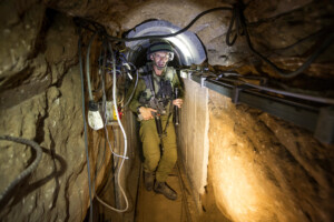 An Israeli soldier during an army organised tour in a tunnel said to be used by Palestinian militants for cross-border attacks, on July 25, 2014. Photographer: Jack Guez/AFP via Getty Images