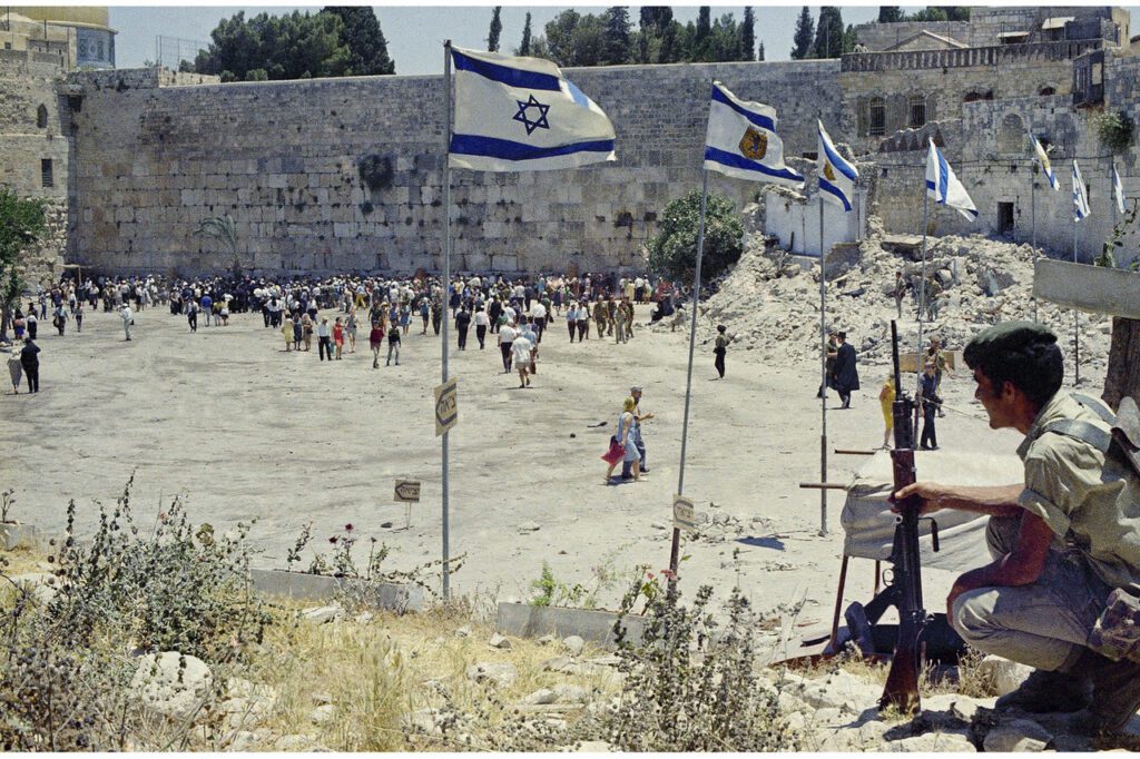 After the Six-Day War ended on June 10, 1967, Israel had taken control of East Jerusalem, the West Bank, the Gaza Strip, the Sinai and the Golan Heights. Here, Israelis guard the Western Wall—a remnant of the Second Temple and the holiest site in Judaism—in the Old City of Jerusalem on June 16, 1967.