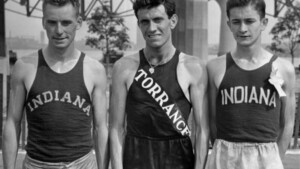 FILE -- In a July 13, 1936 file photo, Don Lash of Indiana, left, Louis Zamperini of Los Angeles, center, and Thomas Deckard of Indiana, who will represent the United States in the Olympic Games in the 5,000 meter team, at the Olympic tryouts in New York. Zamperini, a U.S. Olympic distance runner and World War II veteran who survived 47 days on a raft in the Pacific after his bomber crashed, then endured two years in Japanese prison camps, died Wednesday, July 2, 2014, according to Universal Pictures studio spokesman Michael Moses. He was 97. (AP Photo, File)